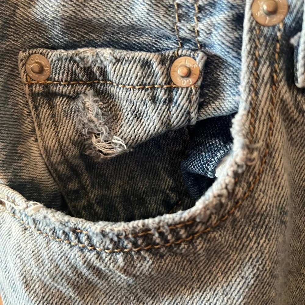 Levi's Premium High Rise Loose Tapered Distressed Denim Jeans